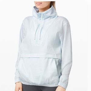 Gently worn Lululemon pack light pullover, size 4. Light blue.